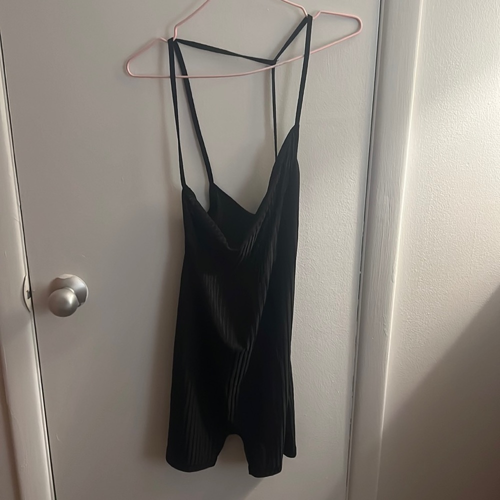 black romper, back visible